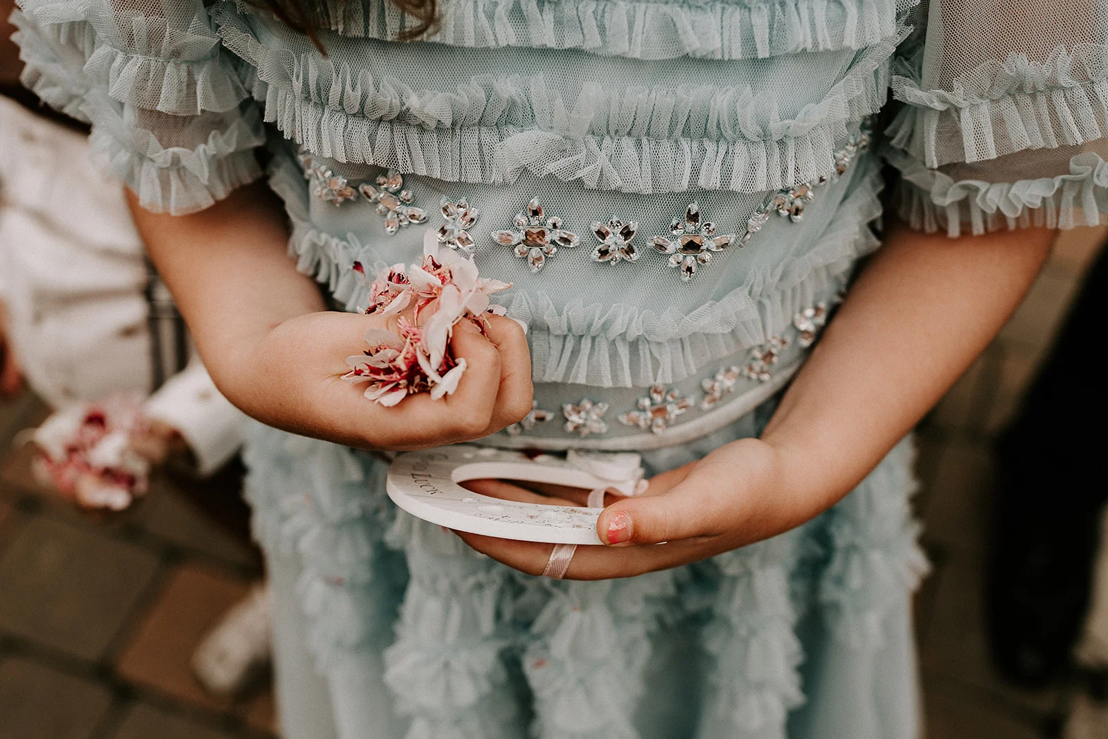A handful ready to throw on the bride and groom