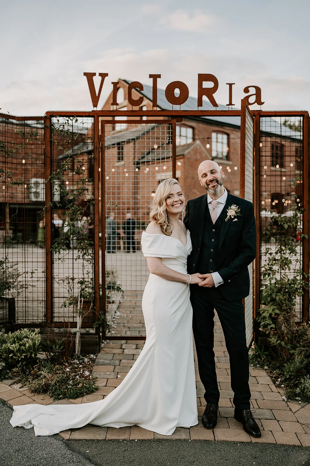 Bride and groom outside the Victoria