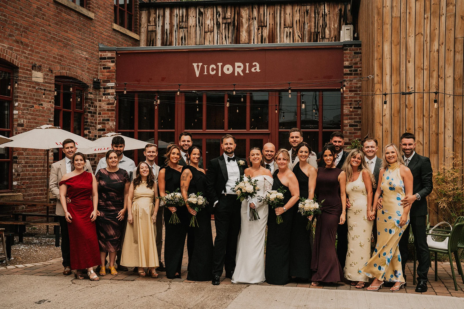 Some of the wedding party out side Victoria
