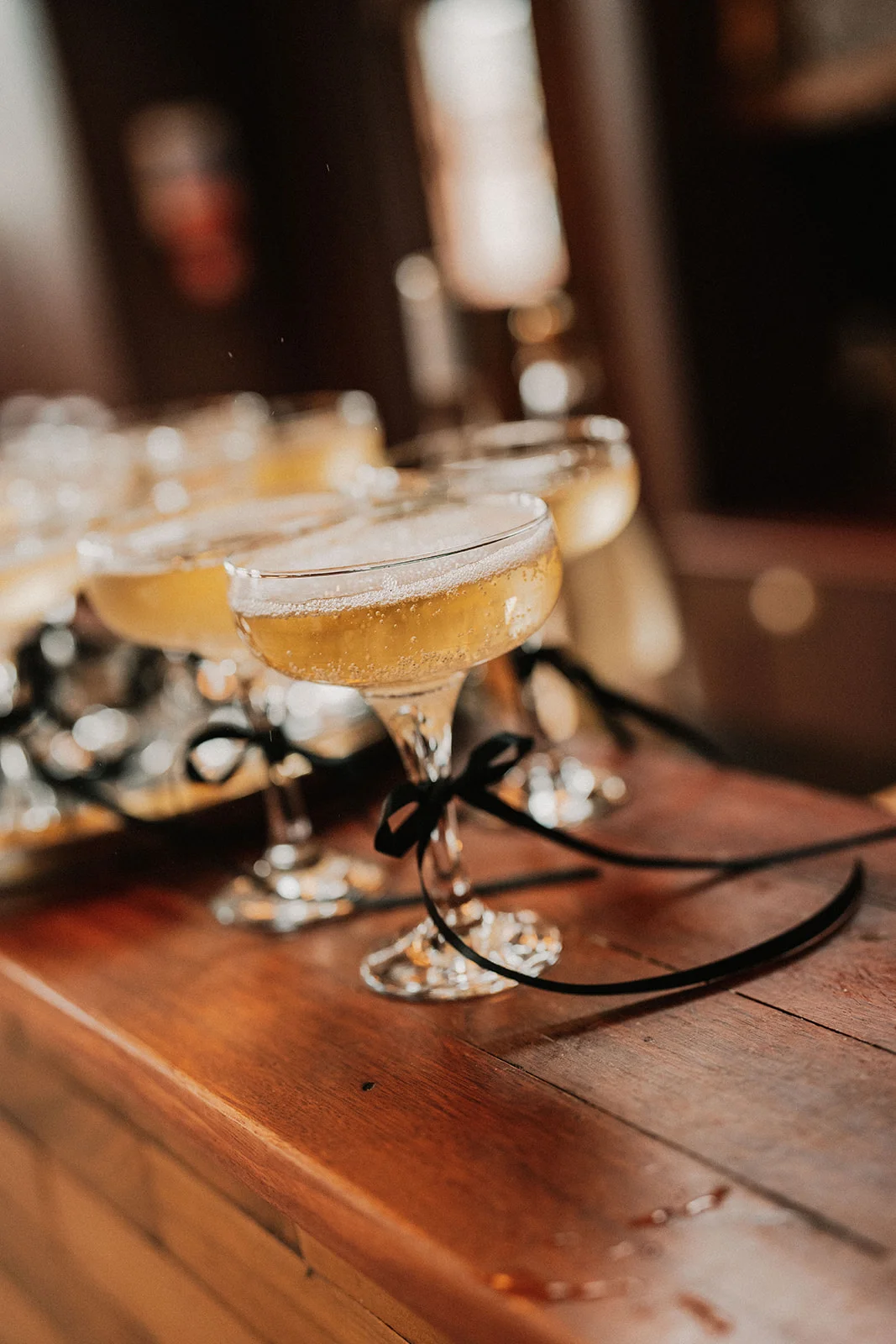 Champagne glasses with little black bows