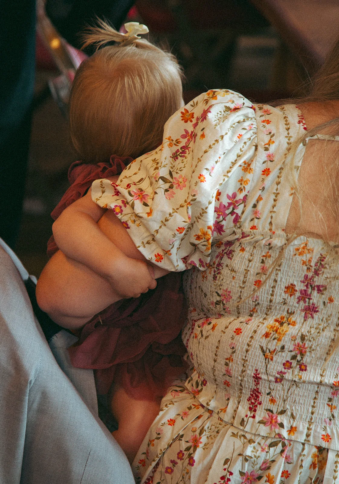 Baby on hip and a pretty dress