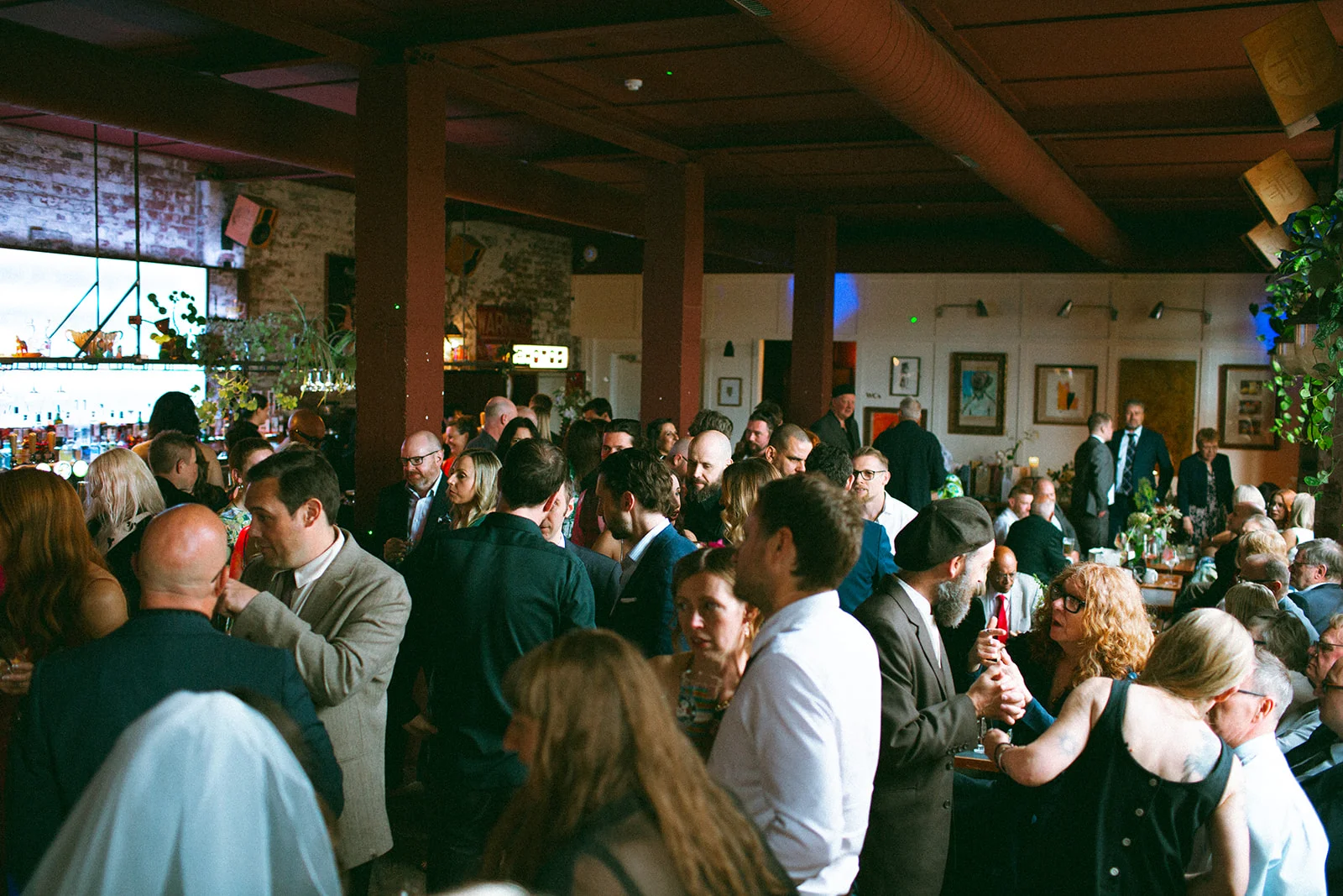 A crowd in the clubhouse