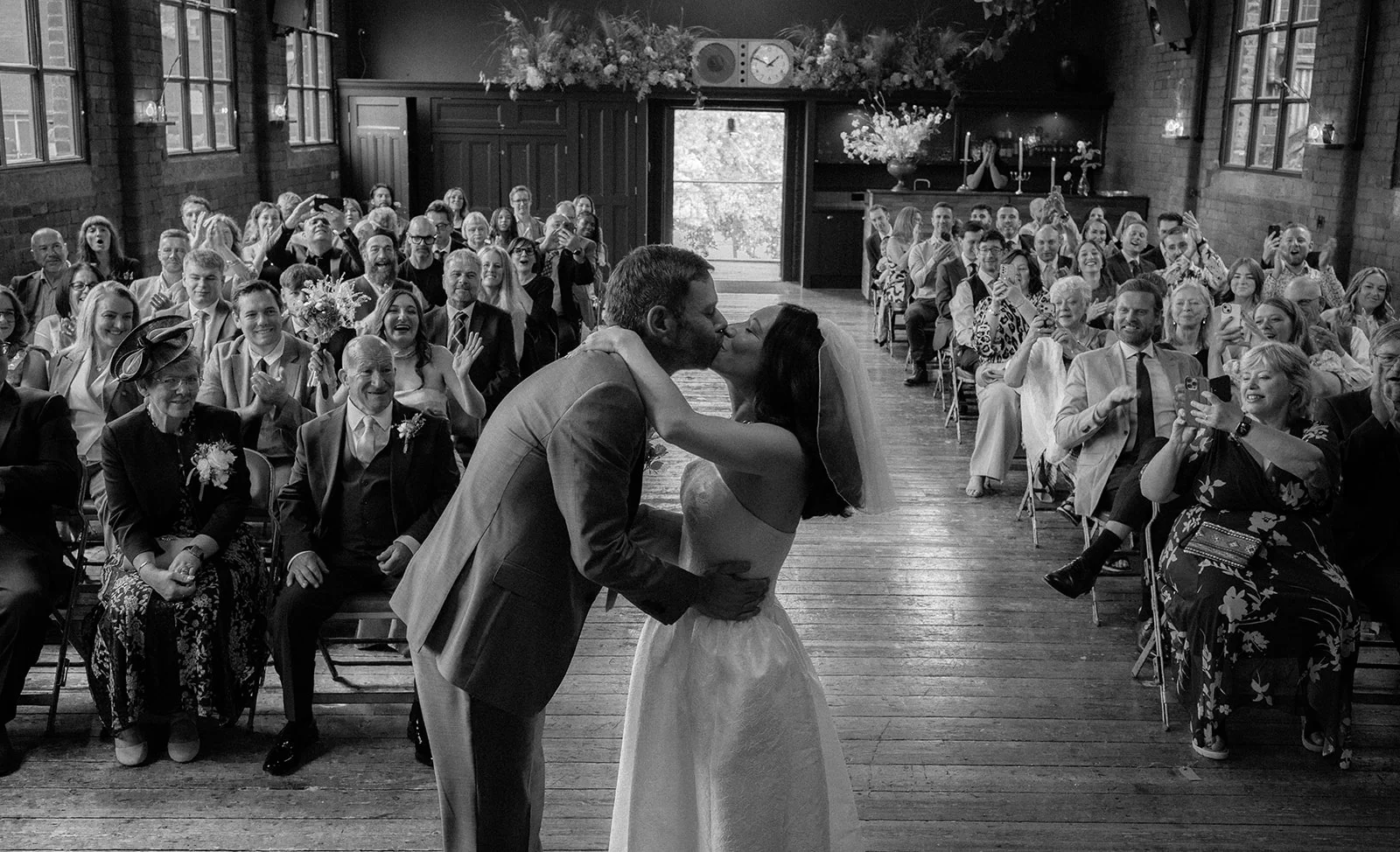 Husband and wife have a kiss