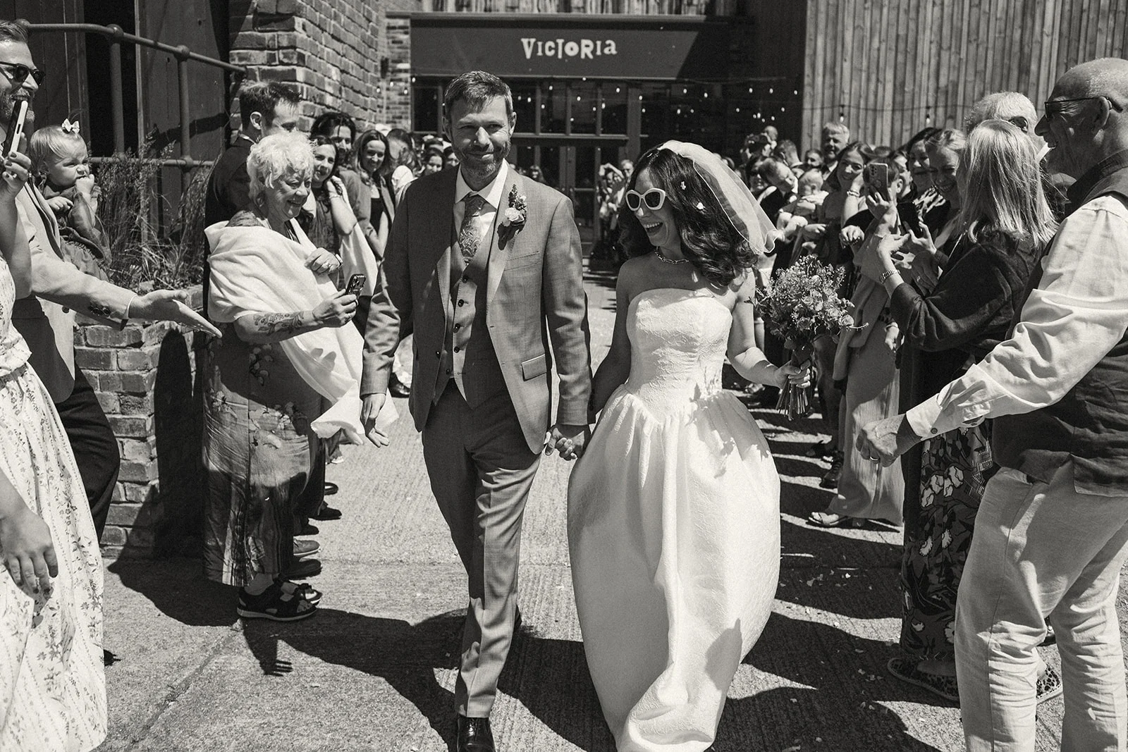 Cheers and confetti from friends and family